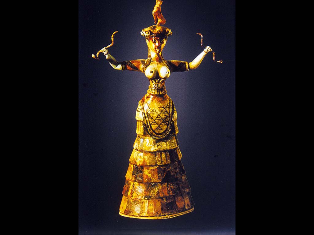 Богиня со змеями из Кносского дворца. Раскрашенная терракота. XVII в. до н. э. Музей Героклион. Крит.